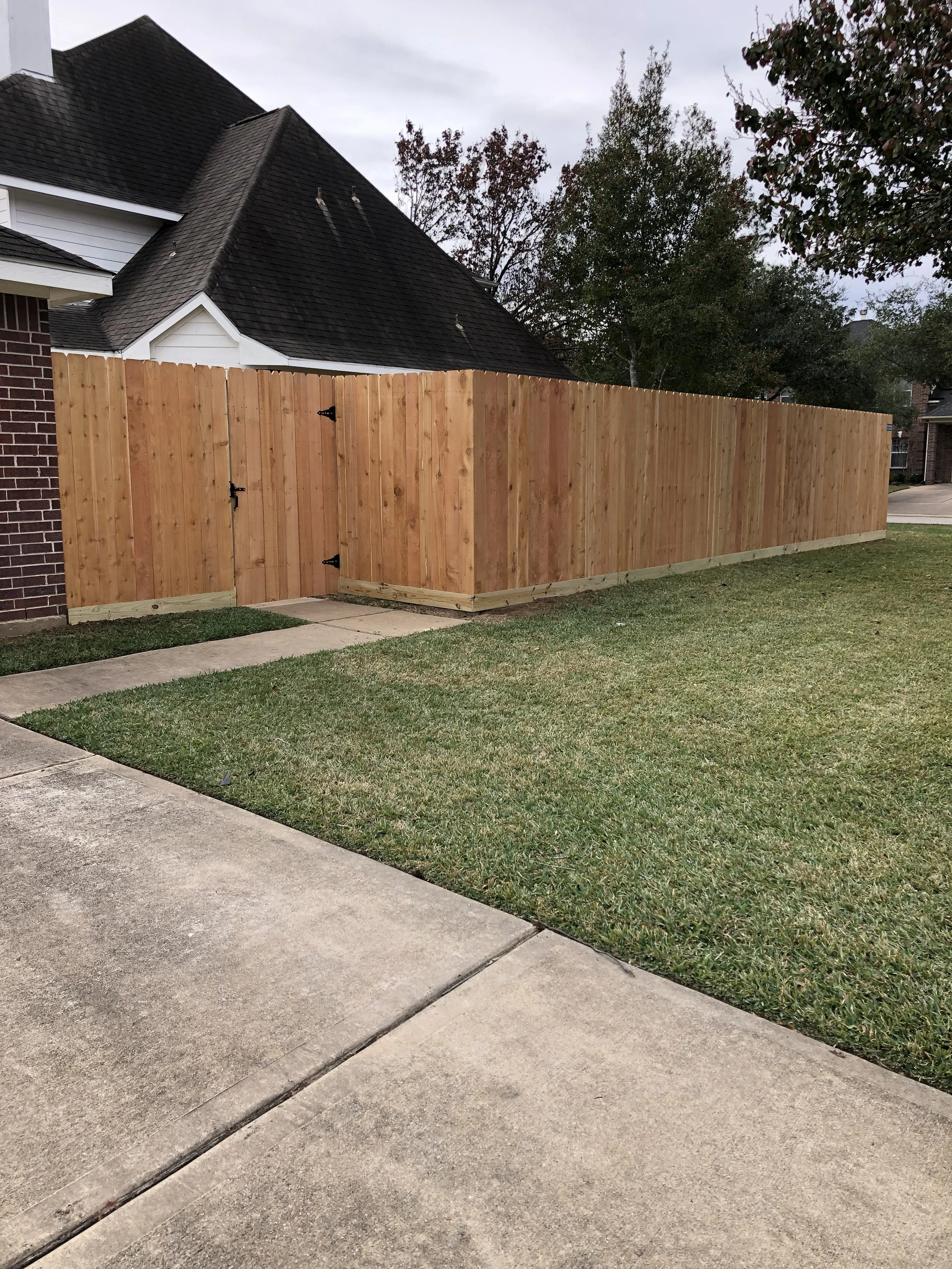 Wood fence installed by Bel Fence